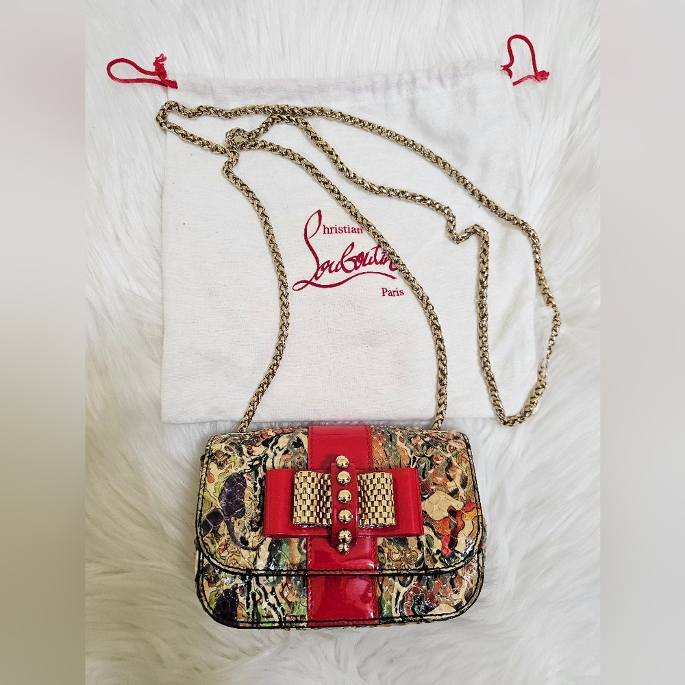 Authentic Christian Louboutin Snakeskin Sweet Charity